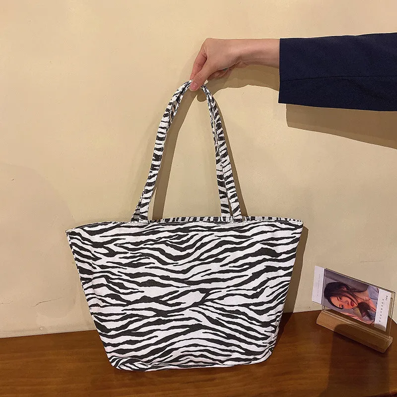Design zebra-striped tote bags